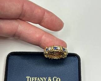 J32 -$5,500. "Tiffany & Co. 750 Schlumberger" Stamped. Sixteen Stone Ring with Diamonds and Sapphires. Size 7.5/8. Jean Schlumberger designed. Still on Tiffanys website!