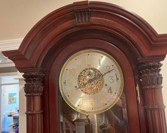 W55 - $1750. SLIGH model 0901-2-CC Grandfather Clock. Measures 31" wide x 15.5" deep x 84" tall. WORKS and we have the key and paperwork! Does have a minor "dent" at the top that you really have to look for.