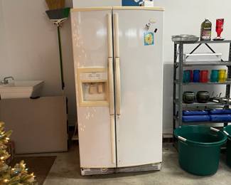 W96 - $75. Garage Fridge. Works just fine!