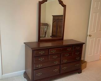 W31 - $175. American Drew 7 Drawer Dresser with Mirror. Measures 56" wide x 19" deep x 32" tall. Mirror is 30" wide x 43" tall.