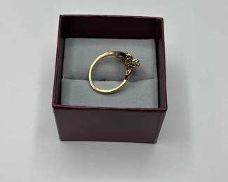 J6 - $300. Size 8.5. 14 kt gold ring with small gemstones (missing 1)