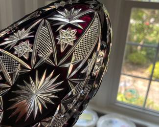 W129 - $30. Cranberry cut to clear crystal bowl. Measures 9" x 5" x 4" tall.