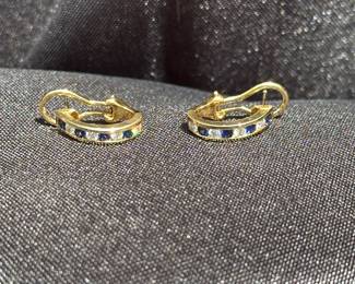 J36 - $1,750. Tiffany & Co. 750. 18kt gold, Diamond & Sapphire Huggie earrings with Omega back. When on has a .75" drop. In excellent condition!