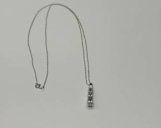 J21 - $120. 10kt white gold chain (17") & 1" Pendant with 2 small diamonds & light blue stones.