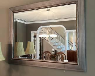 W3 - $50. Kirkland Home Mirror. Measures 46.5" wide x 36.75" tall. Frame is a "brushed" plastic.