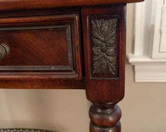 W58 - $225. Four Corner Imports "Crotch Veneer Side Table" from Whitley Furniture Galleries. Measures 27" wide x 16" deep x 30" tall. Gently used in formal living area! Wood with Metal Accents. Single Drawer.