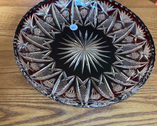 W127 - $40. Cranberry cut to clear bowl. Measures 11" diameter.