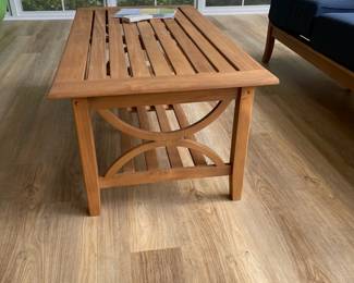 W121 - $200. Cambridge Casual Teak Coffee Table. Excellent condition. Has been used in a 3 season room - protected from pollen! Measures 48" wide x 25" x 18" tall.