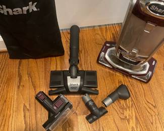 W80 - $95. Shark Rotator bagless with HEPA filter plus attachments.