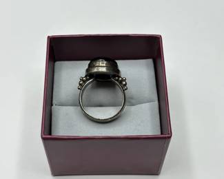 J30 - $25. Size 9 Sterling Ring with Large Black Stone.