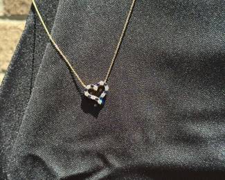 J35 - $900. 18kt gold Diamond Sapphire Heart Pendant Necklace. Stamped "Tiffany & Co. 750" on necklace & pendant. Necklace is 16.5" long.