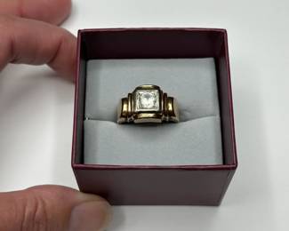 J7 - $425. Size 10. Mens 14kt gold ring with diamond. (Diamond has somehow been scratched on the top the whole way around)