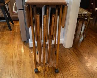 W119 - $50. Folding TV Tables (3) and drop leaf stand on wheels. Water marks on table top (pictured)