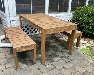 W123 - $100. Outdoor Table and Benches. Table measures 59" wide x 32" deep x 30" tall. Benches measure 47.5" wide x 16" deep x 18" tall