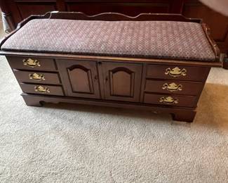 W69 - $50. Vintage Lane Cedar Chest with Key and padded seat. Measures 49" long x 18" deep x 21.5" tall. One bottom corner has chew damage - otherwise good vintage condition.