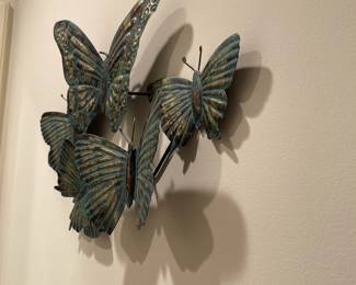 W85 - $18. Metal butterfly wall decor. 19" wide x 13" tall.