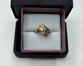 J6 - $300. Size 8.5. 14 kt gold ring with small gemstones (missing 1)