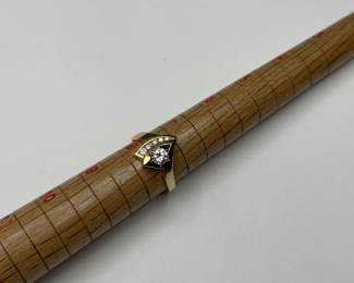 J1 - $300. Size 8. 14kt & diamond ring.