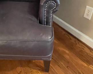 W150 - $150. Hooker Furniture Leather Arm Chair. Measures 28.5"wide x 35" deep x 40" tall.