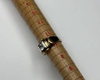 J7 - $425. Size 10. Mens 14kt gold ring with diamond. (Diamond has somehow been scratched on the top the whole way around)