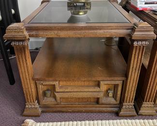 W89 - $35 Pair. Vintage glass top end tables. Measures 24.5" wide x 31" deep x 20" tall.
