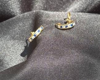 J36 - $1,750. Tiffany & Co. 750. 18kt gold, Diamond & Sapphire Huggie earrings with Omega back. When on has a .75" drop. In excellent condition!