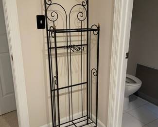 W84 - $40. *2 Available* Black Metal towel rack. 18" wide x 9" deep x 60" tall