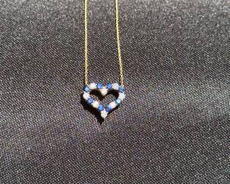 J35 - $900. 18kt gold Diamond Sapphire Heart Pendant Necklace. Stamped "Tiffany & Co. 750" on necklace & pendant. Necklace is 16.5" long.