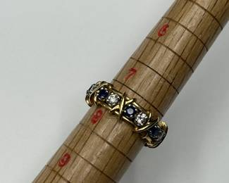 J32 -$5,500. "Tiffany & Co. 750 Schlumberger" Stamped. Sixteen Stone Ring with Diamonds and Sapphires. Size 7.5/8. Jean Schlumberger designed. Still on Tiffanys website!