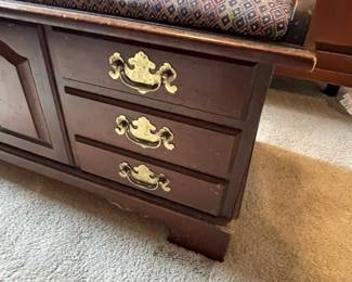 W69 - $50. Vintage Lane Cedar Chest with Key and padded seat. Measures 49" long x 18" deep x 21.5" tall. One bottom corner has chew damage - otherwise good vintage condition.