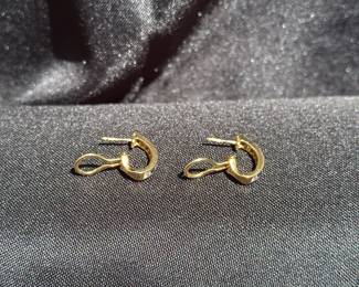 J36 - $1,750. Tiffany & Co. 750. 18kt gold, Diamond & Sapphire Huggie earrings with Omega back. When on has a .75" drop. In excellent condition!