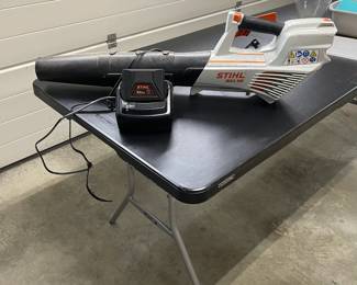 W151 - $100. Stihl leaf blower model BGA 56 with Battery & Charger.
