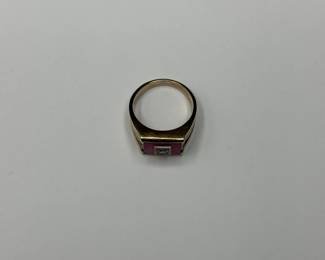 J12 - $400. Size 11 Mens 10kt gold ring. Large red stone with inset diamond.