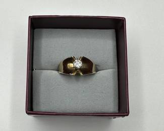 J13 - $400. Size 9. Ladies 14 kt gold ring with center diamond.