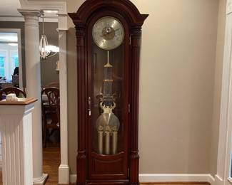 W55 - $1750. SLIGH model 0901-2-CC Grandfather Clock. Measures 31" wide x 15.5" deep x 84" tall. WORKS and we have the key and paperwork! Does have a minor "dent" at the top that you really have to look for.