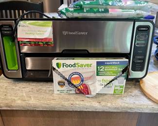 W105 - $65. Food Saver and bags