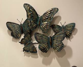 W85 - $18. Metal butterfly wall decor. 19" wide x 13" tall.