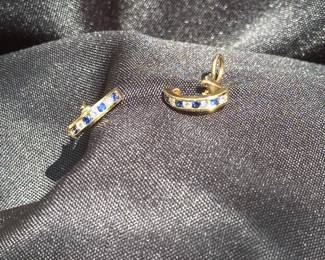 J36 - $1,750. Tiffany & Co. 750. 18kt gold, Diamond & Sapphire Huggie earrings with Omega back. When on has a .75" drop. In excellent condition!