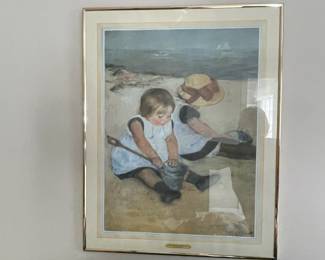 W28 - $15. Framed Print of "Children Playing on the Beach" by Mary Cassatt. Measures 22" x 28" framed.