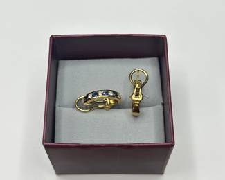 J36 - $1,750. Tiffany & Co. 750. 18kt gold, Diamond & Sapphire Huggie earrings with Omega back. When on has a .75" drop. In excellent condition!