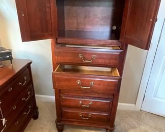 W67 - $200. Newport Cabinet - Solid Wood Furniture. Measures 26" wide x 17" deep x 57.5" tall. Does show signs of wear / minor scratches.