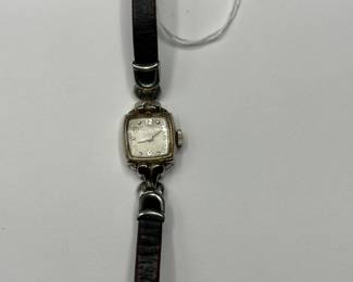 J22 - $35. Small Ladies Hamilton 10kt GF. Leather Band.