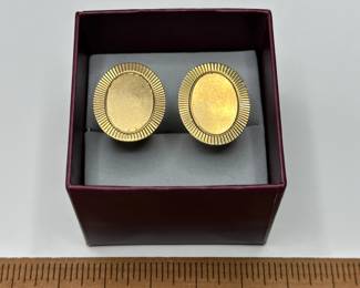 J19 - $640. 14kt gold cuff links.