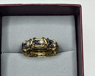 J32 -$5,500. "Tiffany & Co. 750 Schlumberger" Stamped. Sixteen Stone Ring with Diamonds and Sapphires. Size 7.5/8. Jean Schlumberger designed. Still on Tiffanys website!