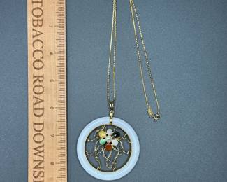 J20 - $500. 14kt gold necklace and White Jade & 14kt Pendant. Chain is 21" long. Pendant is 2.25" across. With gemstones & pearl in a flower pattern.
