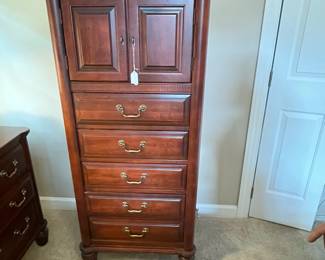 W67 - $200. Newport Cabinet - Solid Wood Furniture. Measures 26" wide x 17" deep x 57.5" tall. Does show signs of wear / minor scratches.