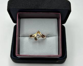 J4 - $325. Size 9. 14kt & diamond ring.