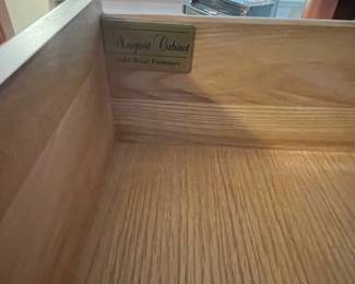 W67 - $200. Newport Cabinet - Solid Wood Furniture. Measures 26" wide x 17" deep x 57.5" tall. Does show signs of wear / minor scratches.