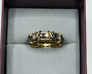 J32 -$5,500. "Tiffany & Co. 750 Schlumberger" Stamped. Sixteen Stone Ring with Diamonds and Sapphires. Size 7.5/8. Jean Schlumberger designed. Still on Tiffanys website!