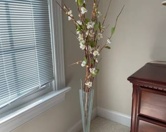 W13 - $25. Decorative Glass Vase on Stand. Measures 24" from floor to top of vase. Tag Reads - "Round The House. Made in America".